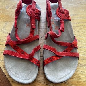 Merrell women’s sandals. Size 7. Red/orange. Never worn.